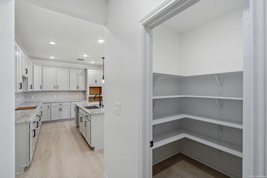 Furnished interior view inside a new home in Bison Ridge, San Antonio (Image 12).
