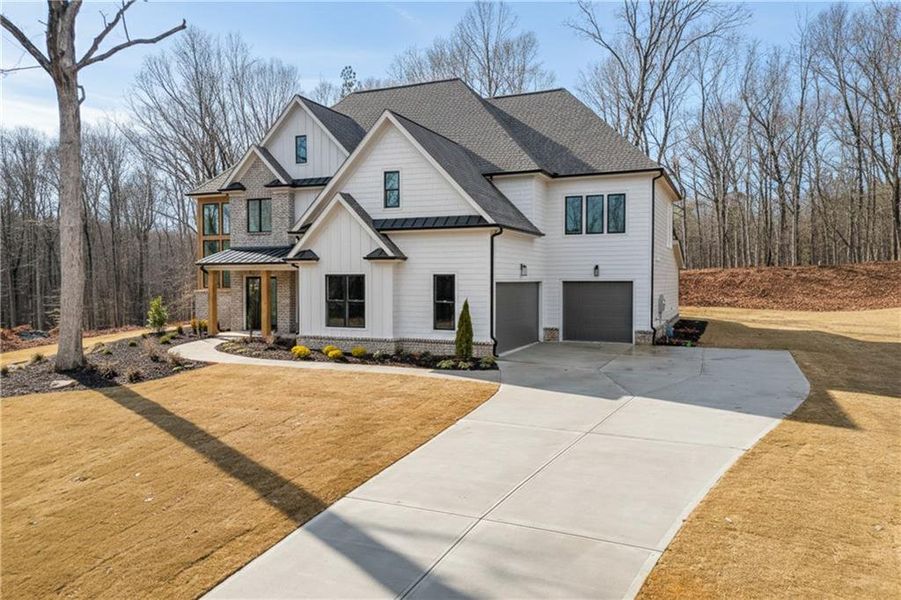 Front exterior of a new home in , Pendergrass, GA, highlighting curb appeal (Image 25).