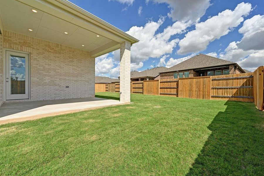 Exterior details and patio area of a home in 6 Creeks at Waterridge: 55ft. lots, Kyle (Image 26). Exterior details and patio area of a home in 6 Creeks at Waterridge: 55ft. lots, Kyle (Image 26).