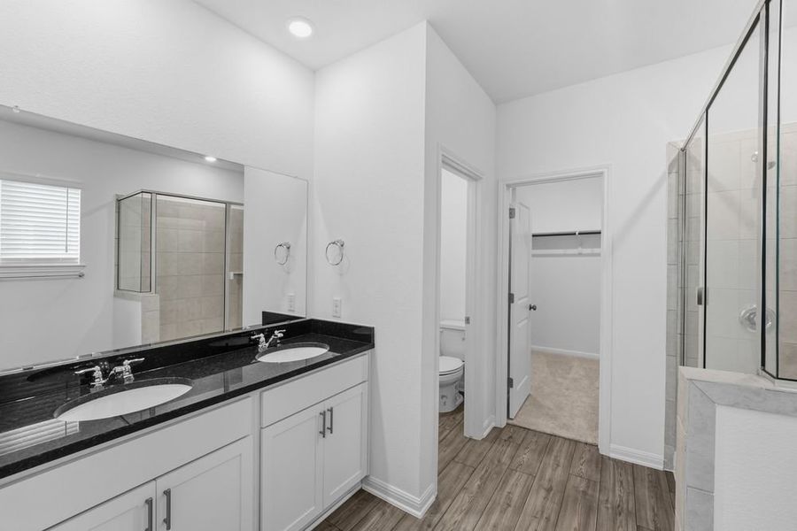 Furnished interior view inside a new home in Longview 40s, Del Valle (Image 8).