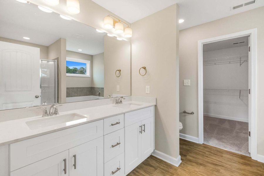 Representative furnished interior of a home built from the Drayton by Caviness & Cates Communities in Bartlett Manor, Youngsville (Image 230).