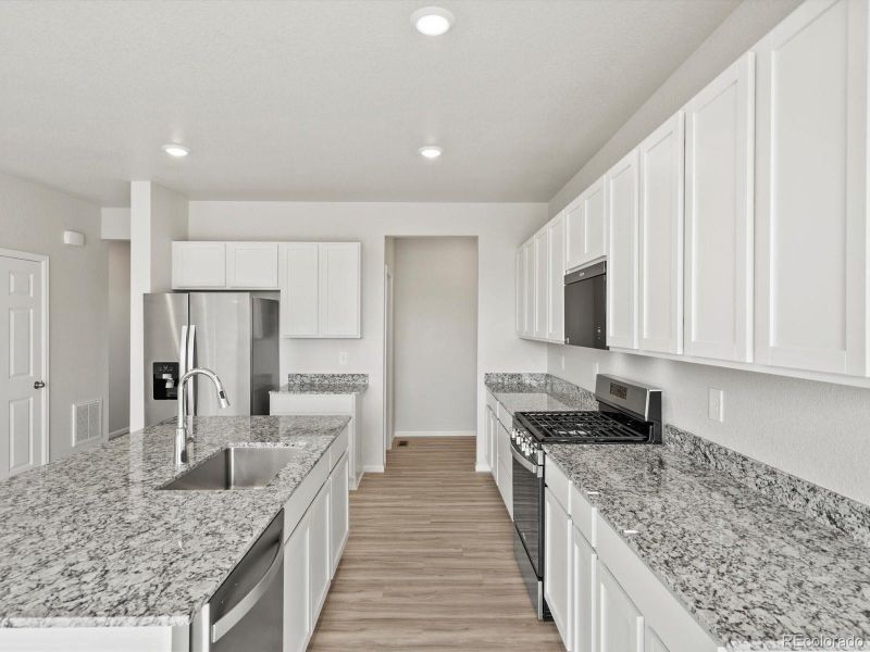 Furnished interior view inside a new home in Poudre Heights: The Lakes Collection, Windsor (Image 6).