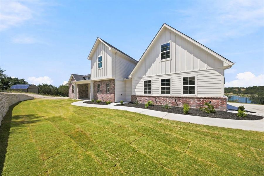 Front exterior of a new home in , Bluff Dale, TX, highlighting curb appeal (Image 22). Front exterior of a new home in , Bluff Dale, TX, highlighting curb appeal (Image 22).