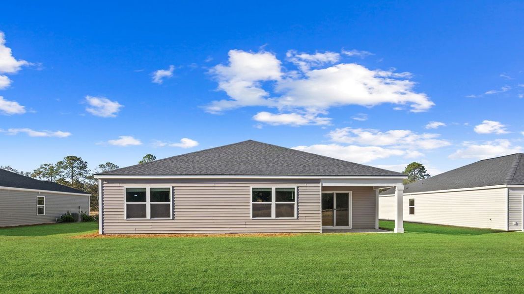 Exterior details and patio area of a home in Palm Ridge, Guyton (Image 22). Exterior details and patio area of a home in Palm Ridge, Guyton (Image 22).