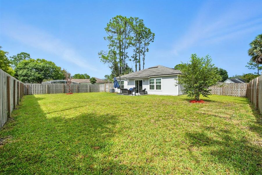 Front exterior of a new home in Palm Coast Homesites, Palm Coast, FL, highlighting curb appeal (Image 27).