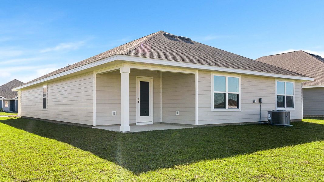 Front exterior of a new home in Liberty, Panama City, FL, highlighting curb appeal (Image 18).