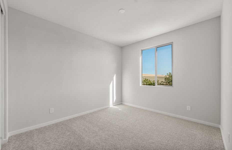 Spacious, unfurnished interior of a new home in Legado West, Queen Creek (Image 30).