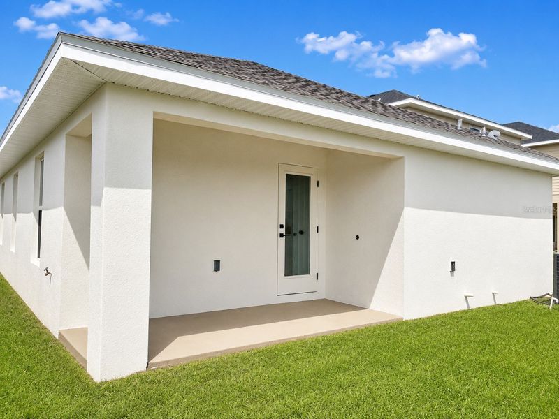 Exterior details and patio area of a home in Harmony Central, St. Cloud (Image 11).