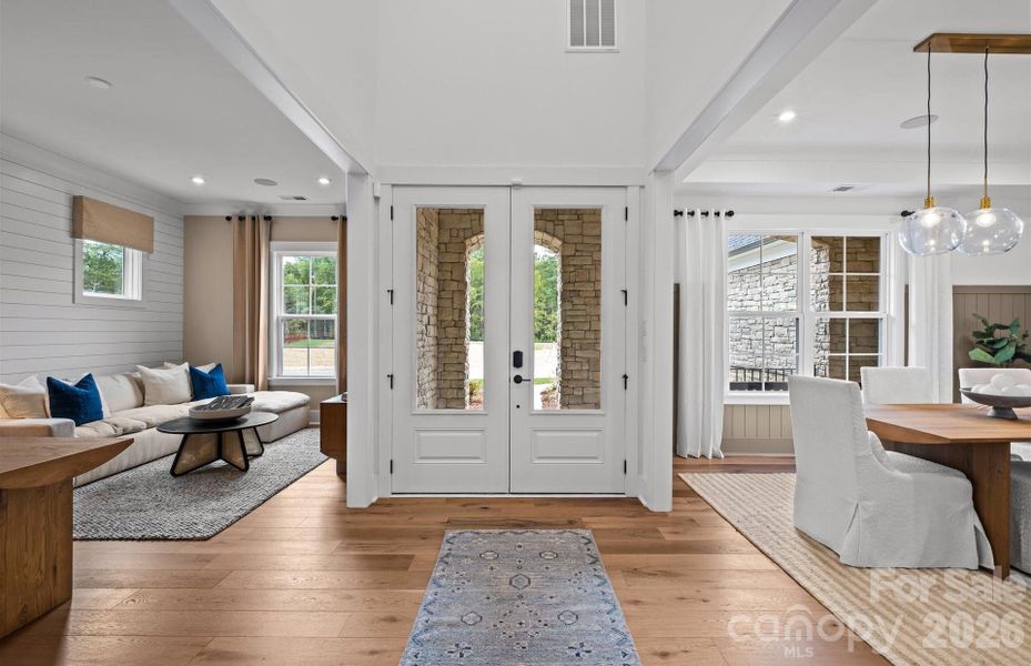 Spacious 2-story foyer with double front door entry open to formal dining room and spacious casual living room. Representative Photo Spacious 2-story foyer with double front door entry open to formal dining room and spacious casual living room. Representative Photo