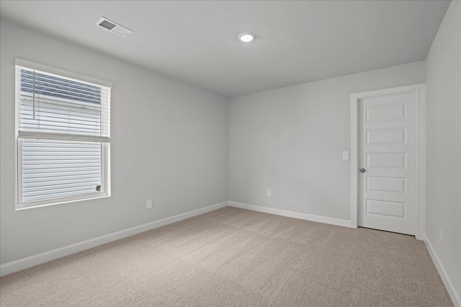 Spacious, unfurnished interior of a new home in The Farm at Wells Creek - Signature Collection, Gray Court (Image 16).