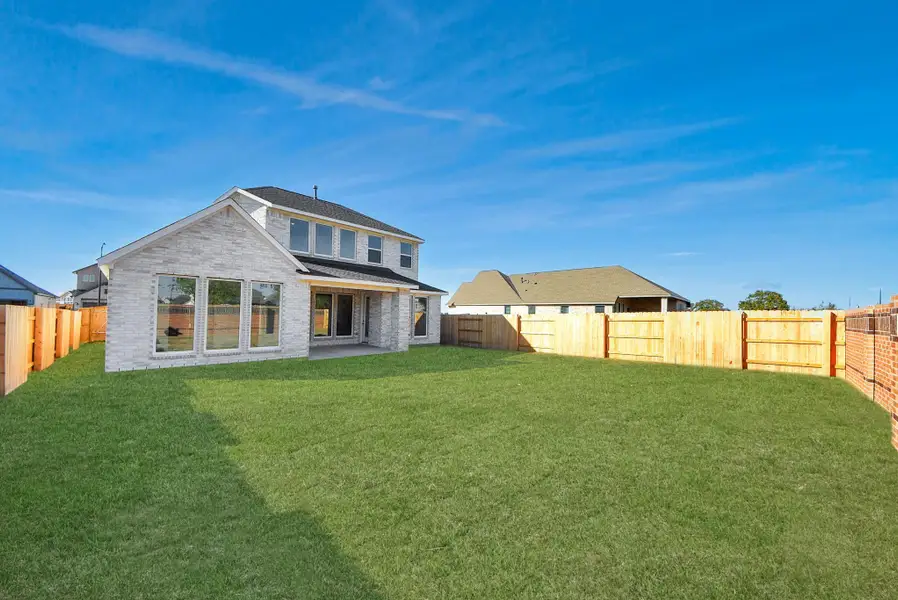 Exterior details and patio area of a home in Elyson, Katy (Image 27).