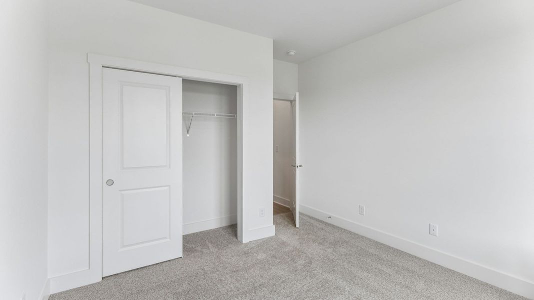 Spacious, unfurnished interior of a new home in The Courtyards at Stewarts Creek, Smyrna (Image 26).