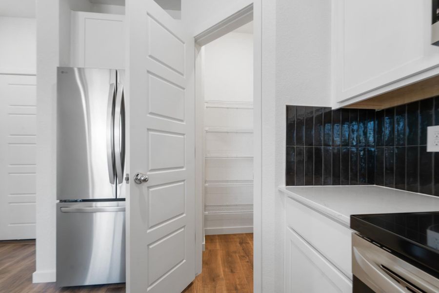 Furnished interior view inside a new home in Conestoga, Ault (Image 7).