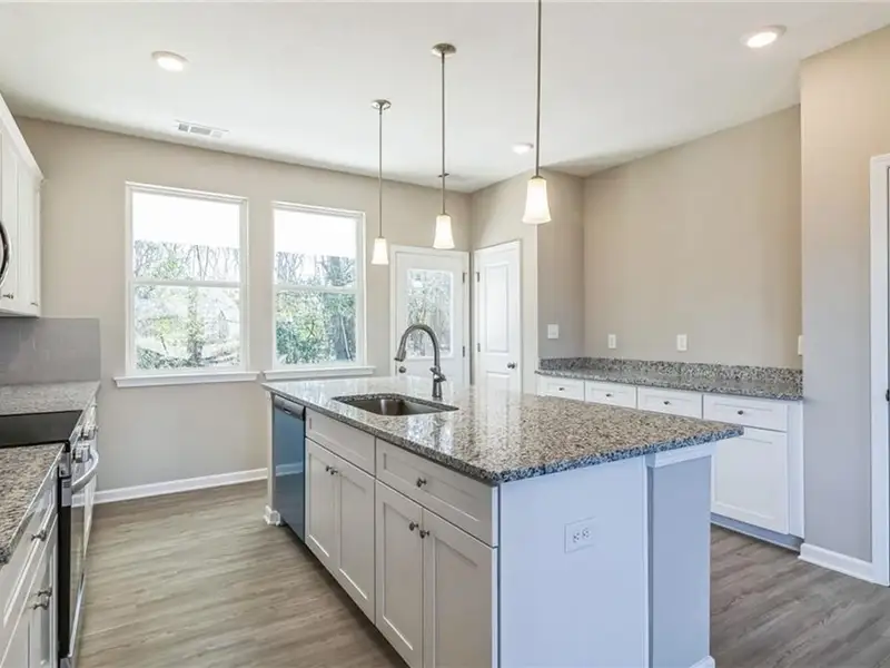 Furnished interior view inside a new home in Ivy Glen, Perry (Image 3).