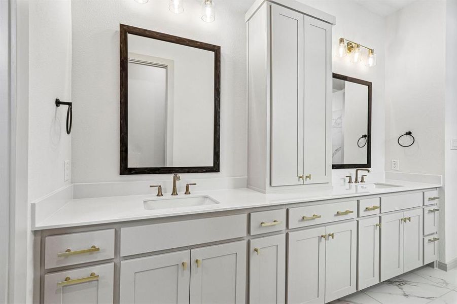 Your thoughtfully designed owner's bath offers ample room for two!