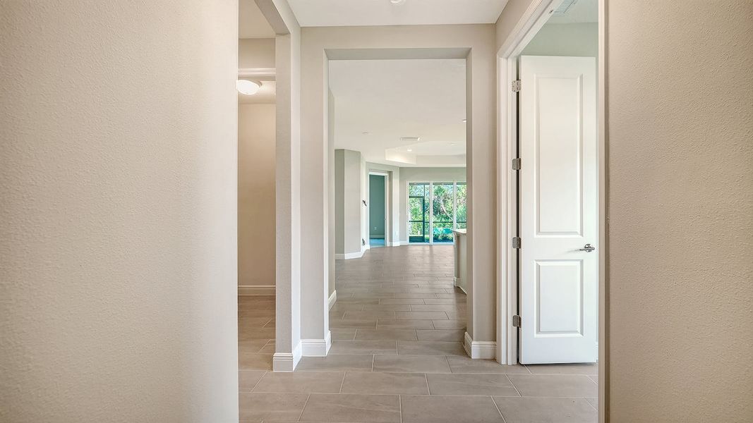 Spacious, unfurnished interior of a new home in Wildleaf Real Estate and Homes for Sale in Parrish, FL - Neal Communities, Parrish (Image 19).