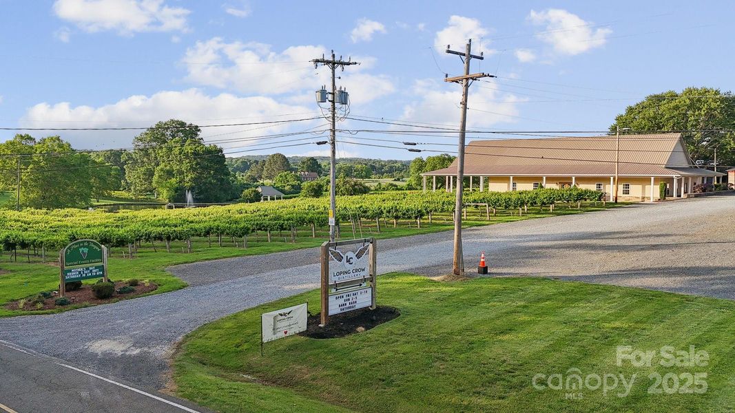 Front exterior of a new home in Running Creek, Locust, NC, highlighting curb appeal (Image 22).