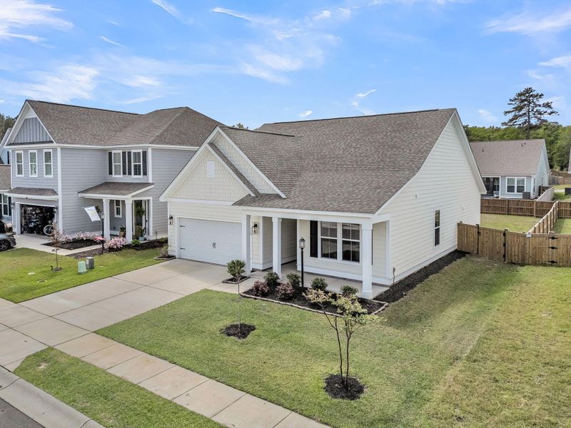 Front exterior of a new home in High Point at Foxbank, Moncks Corner, SC, highlighting curb appeal (Image 29).