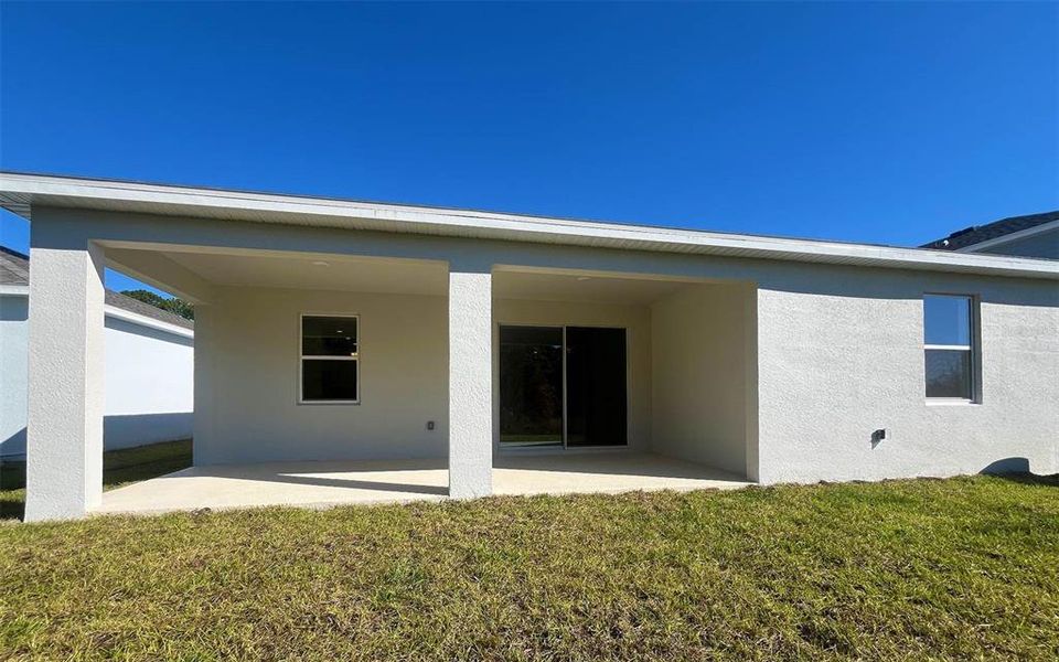 Exterior details and patio area of a home in Pine Meadows Reserve, Eustis (Image 2).