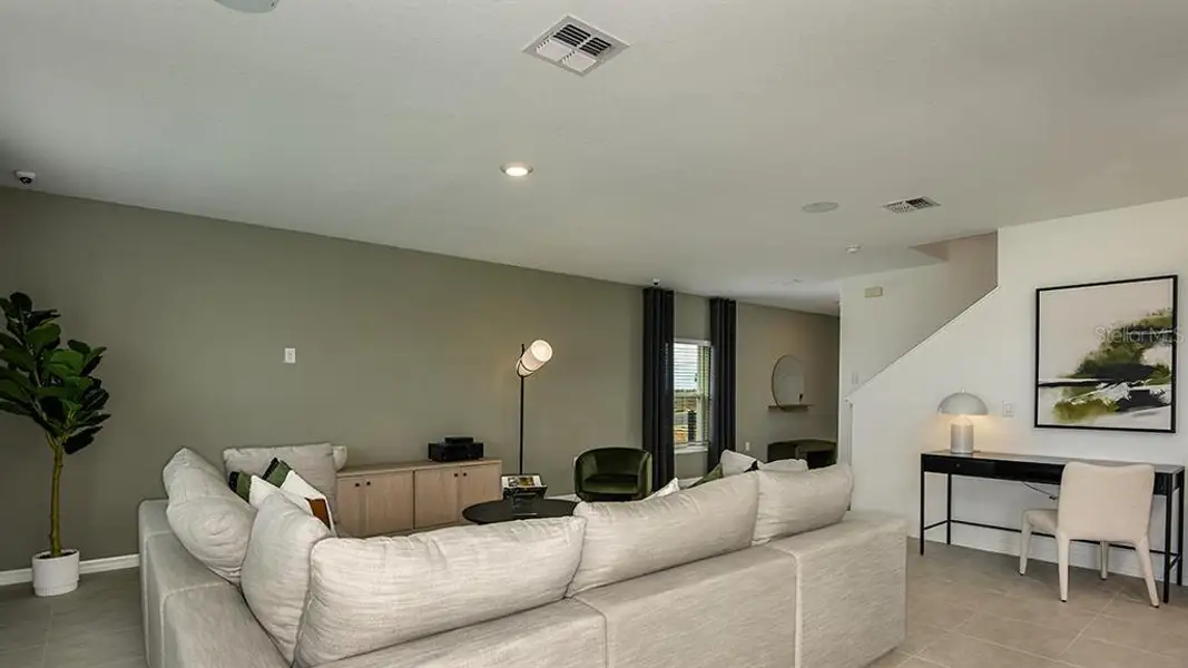Furnished interior view inside a new home in Waterstone, Groveland (Image 4).