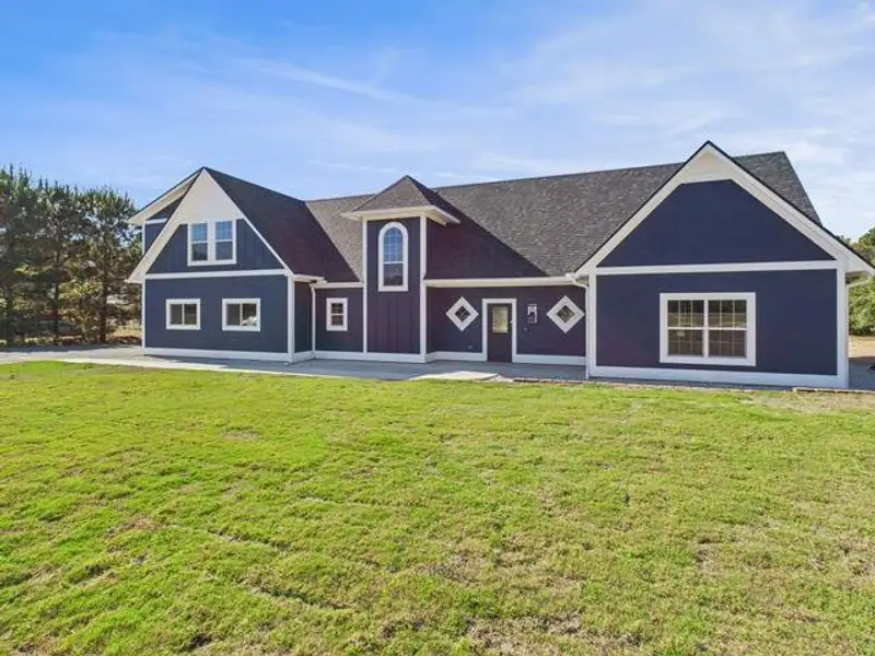 Before Photoof front of house with a front lawn