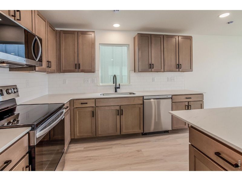 Furnished interior view inside a new home in Bloom Trailblazer Collection - Single Family Homes, Fort Collins (Image 11).
