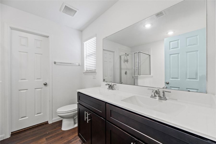 Dual sink vanity in the primary bathroom. Dual sink vanity in the primary bathroom.