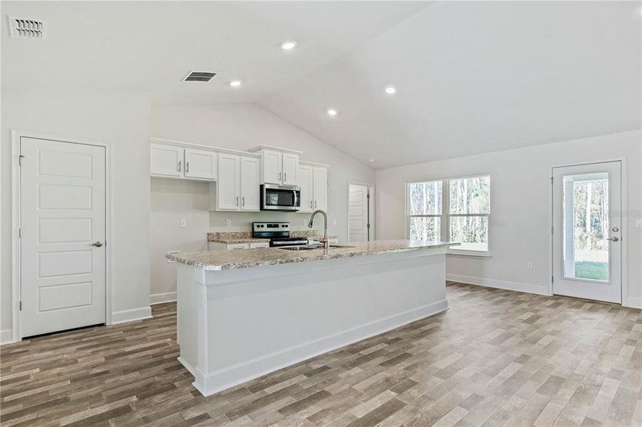 Furnished interior view inside a new home in Palm Coast, Palm Coast (Image 5). Furnished interior view inside a new home in Palm Coast, Palm Coast (Image 5).