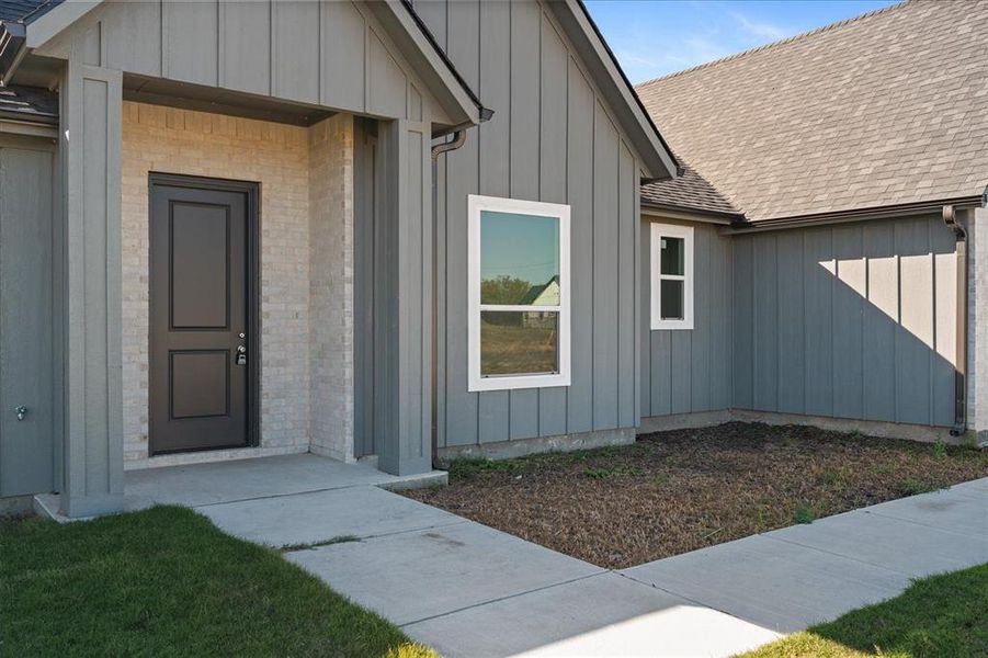 Exterior details and patio area of a home in Briar Branch Estates, Celeste (Image 4). Exterior details and patio area of a home in Briar Branch Estates, Celeste (Image 4).