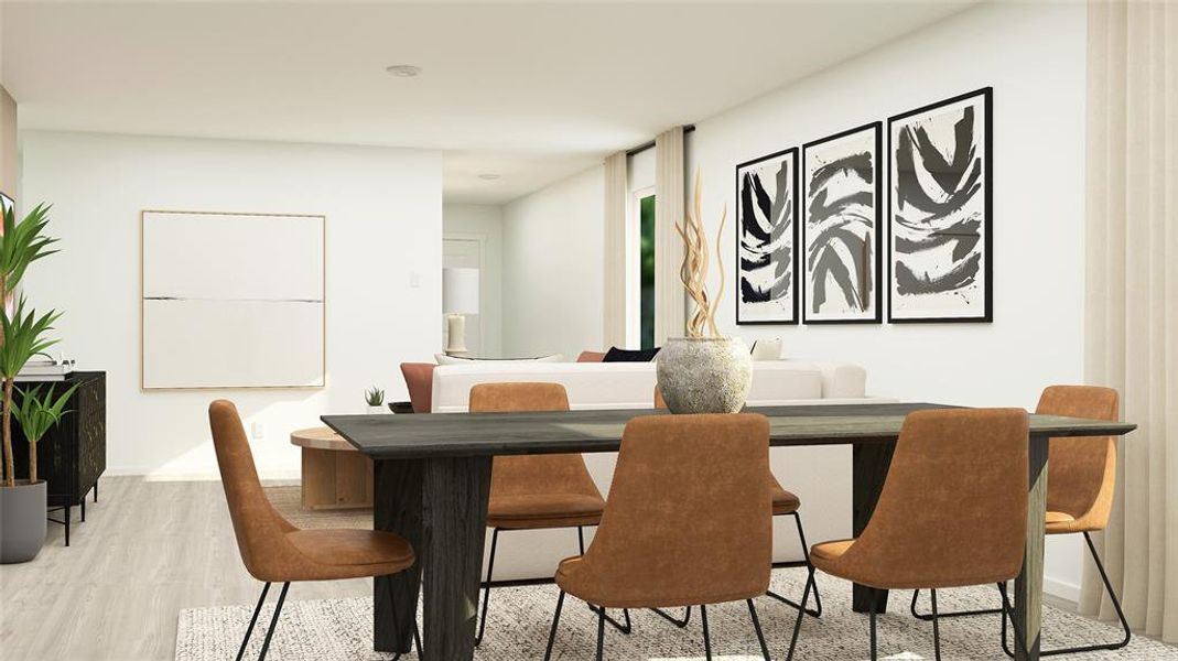 Open-concept living area featuring light wood-finish flooring and recessed lighting Open-concept living area featuring light wood-finish flooring and recessed lighting