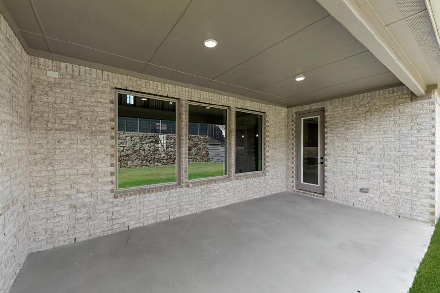 Exterior details and patio area of a home in Union Park, Little Elm (Image 4).
