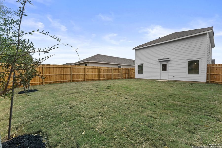 Exterior details and patio area of a home in Torian Village: Belmar Collection, San Antonio (Image 2).
