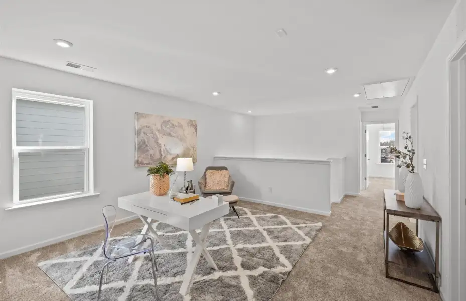 Furnished interior view inside a new home in Riverstone, Monroe (Image 3).