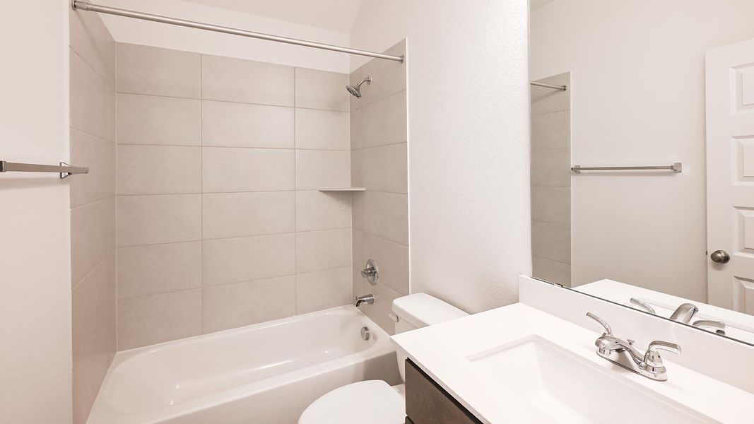 Furnished interior view inside a new home in Crosswinds 40', Kyle (Image 8).