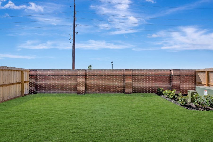 Exterior details and patio area of a home in Sienna - Grove Collection, Missouri City (Image 3).