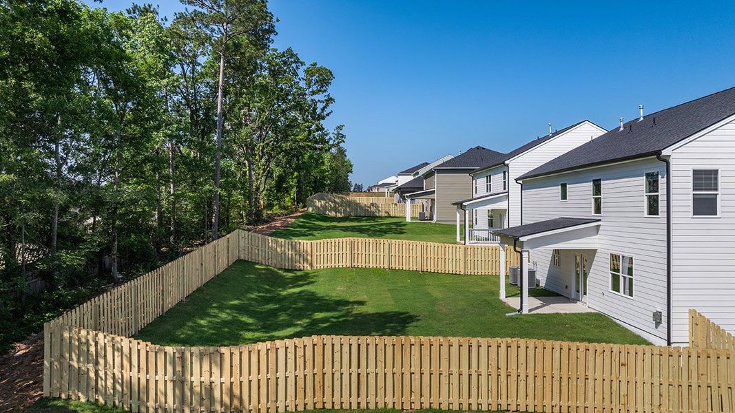 Exterior details and patio area of a home in Estates at Deer Hollow, Grovetown (Image 3).