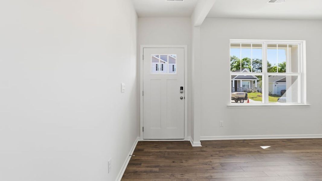Spacious, unfurnished interior of a new home in Durbin Meadows Traditions, Fountain Inn (Image 19).