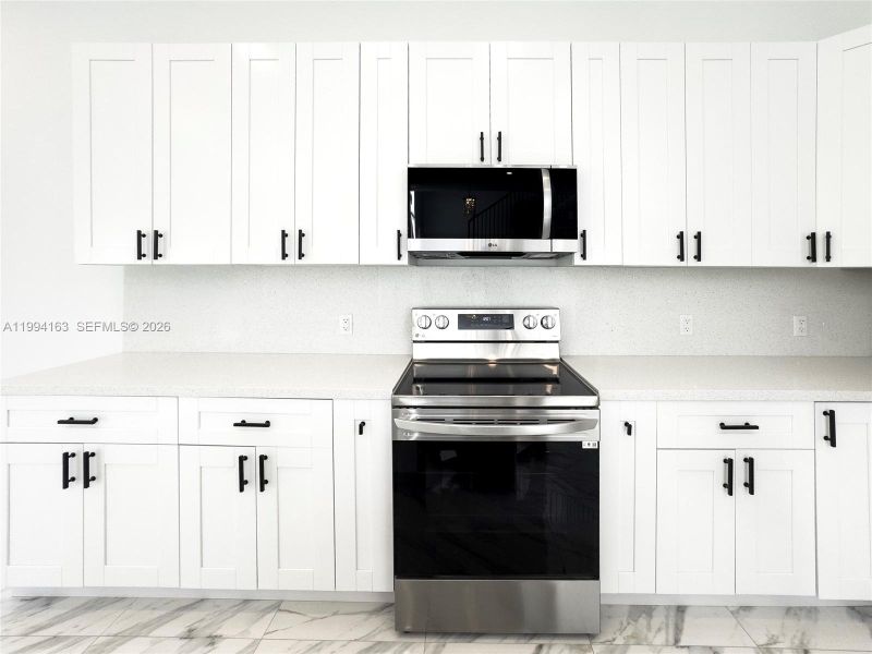 Furnished interior view inside a new home in , Port St. Lucie (Image 6).