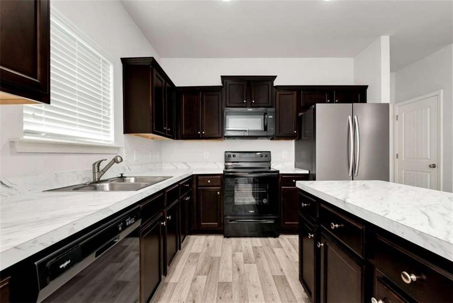 Furnished interior view inside a new home in , Commerce (Image 6).