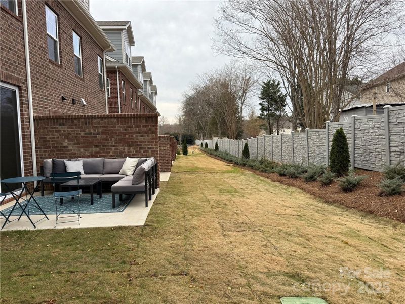Exterior details and patio area of a home in The Townes at Wade Ardrey, Charlotte (Image 3).