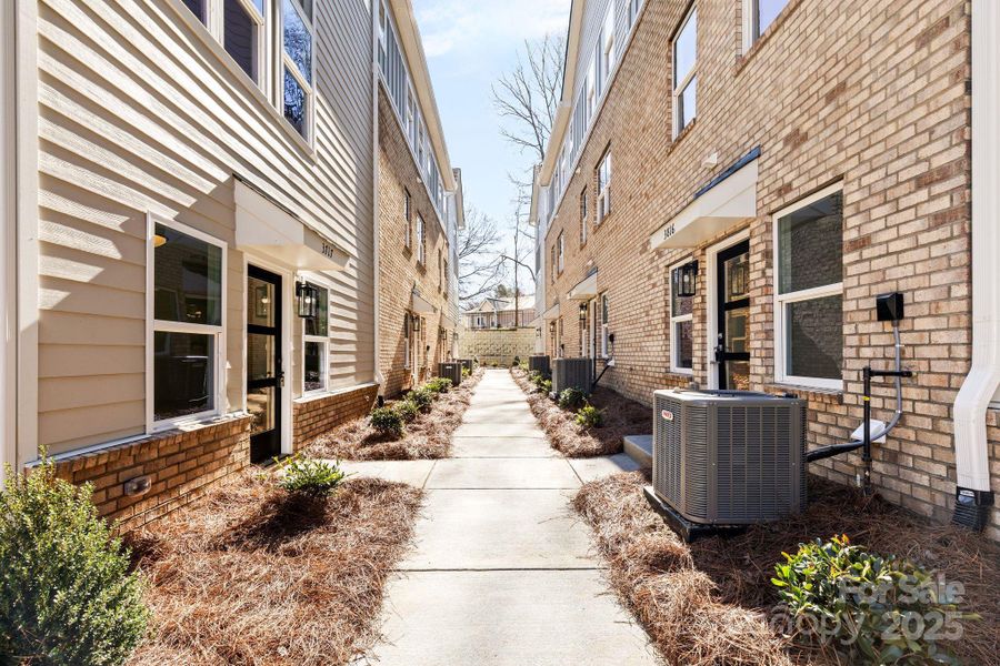 Front exterior of a new home in , Charlotte, NC, highlighting curb appeal (Image 2).