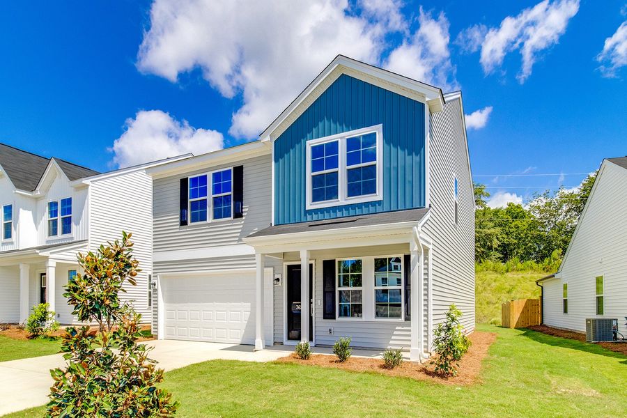 Front exterior of a new home in Bluefield, Lexington, SC, highlighting curb appeal (Image 2). Front exterior of a new home in Bluefield, Lexington, SC, highlighting curb appeal (Image 2).