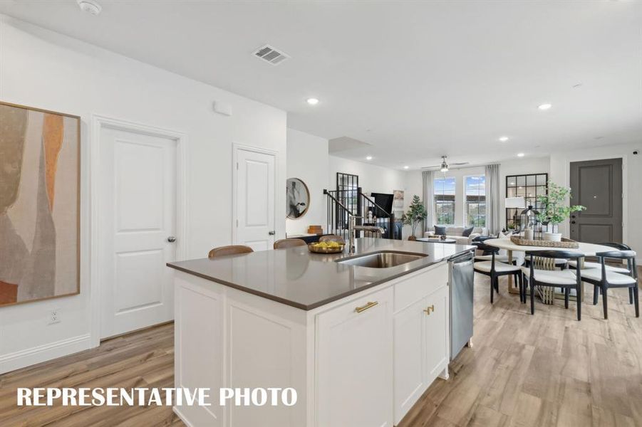 Our Parker plan offers an open and flowing main level so the chef will never be left out of the party!  REPRESENTATIVE PHOTO