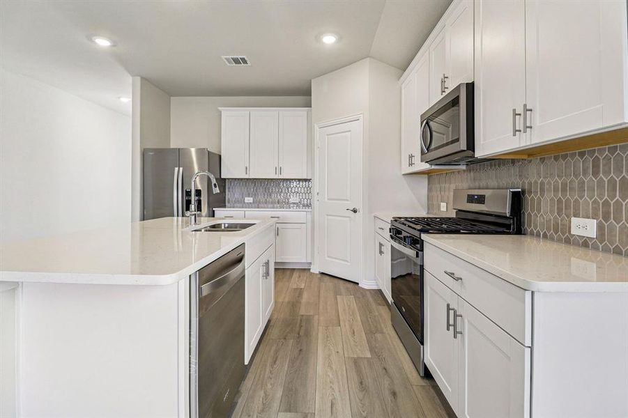 Photo is not of the actual home, but is an inspirational photo of builder’s model home and may depict options, furnishings, and/or decorator features that are not included.