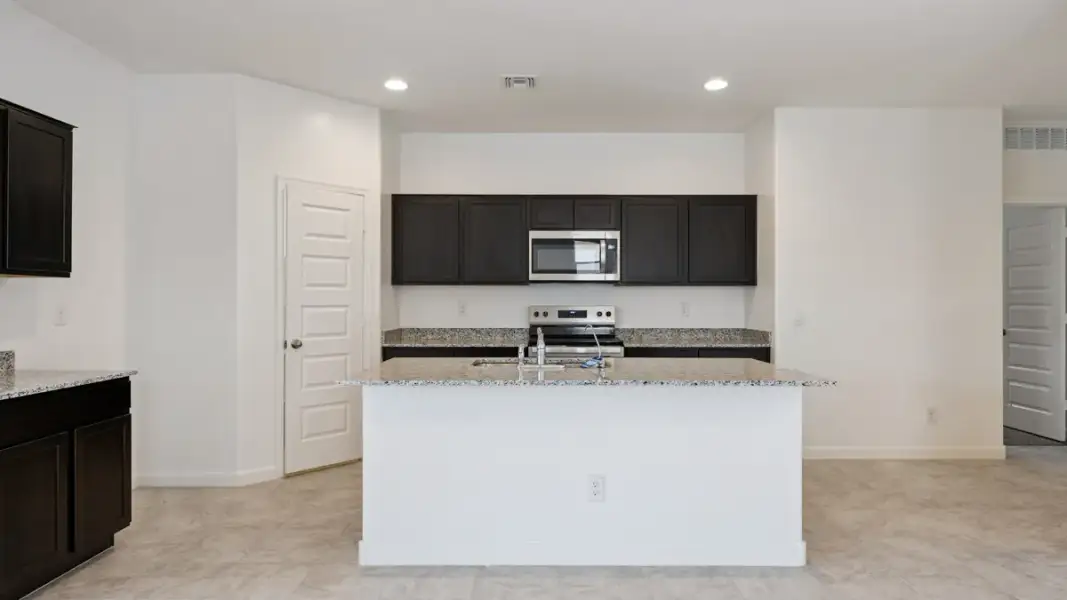 Furnished interior view inside a new home in Magma Ranch Vistas, Florence (Image 7).