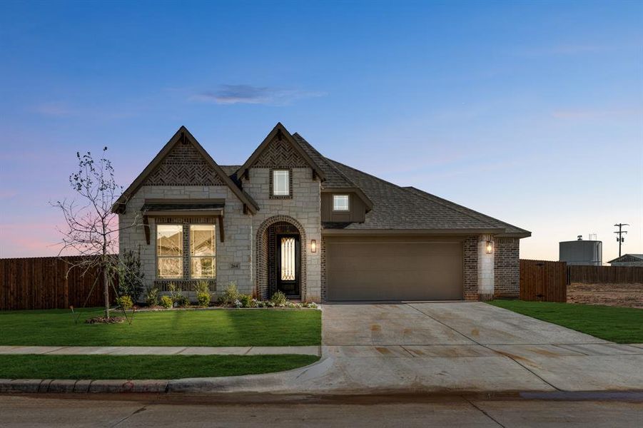 Front exterior of a new home in El Dorado, Granbury, TX, highlighting curb appeal (Image 2). Front exterior of a new home in El Dorado, Granbury, TX, highlighting curb appeal (Image 2).