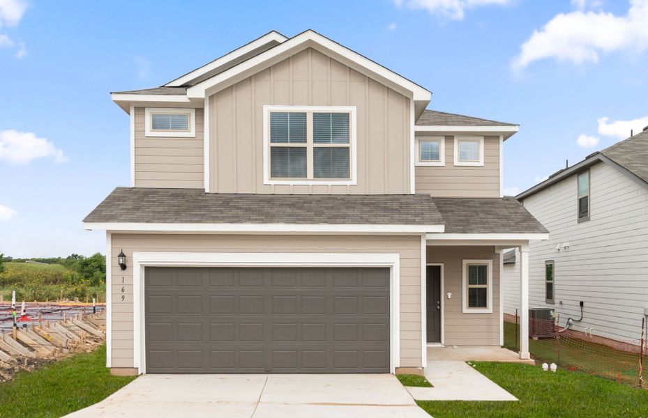 Front exterior of a new home in Sonterra, Jarrell, TX, highlighting curb appeal (Image 22). Front exterior of a new home in Sonterra, Jarrell, TX, highlighting curb appeal (Image 22).