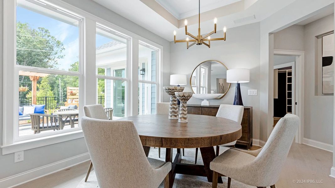 Furnished interior view inside a new home in The Courtyards at Bailey Farm, Dacula (Image 8).