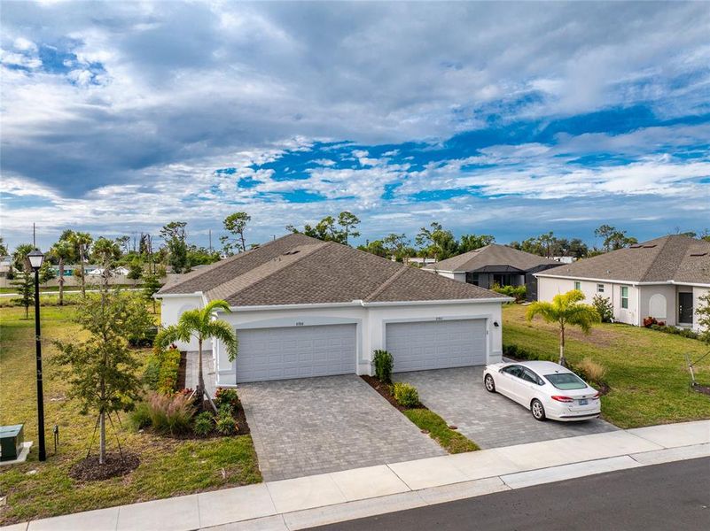 Front exterior of a new home in , Englewood, FL, highlighting curb appeal (Image 2). Front exterior of a new home in , Englewood, FL, highlighting curb appeal (Image 2).