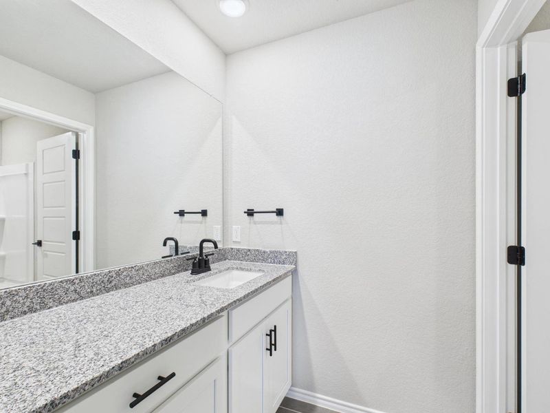 Representative furnished interior of a home built from the The Charlotte A by Davidson Homes LLC in Cedar Heights, San Antonio (Image 11).